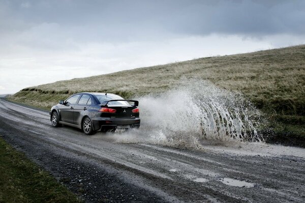 Splashes from wheels during racing