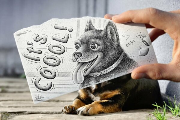 A hand with the image of a dog s muzzle covering the dog itself