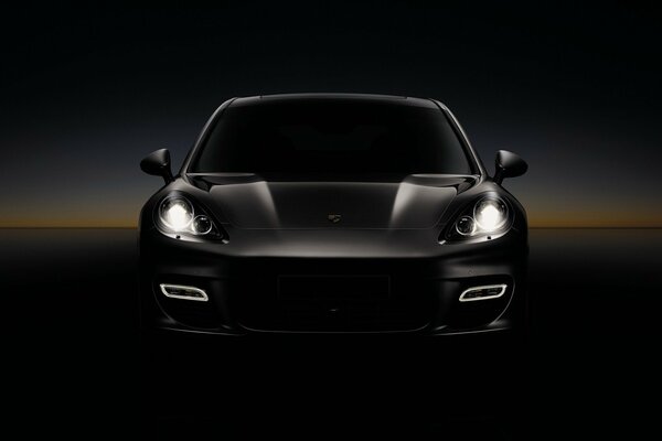 Porsche panamera car on a black background