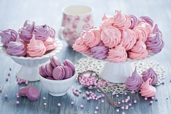 Plates with sweets: meringue and cookies