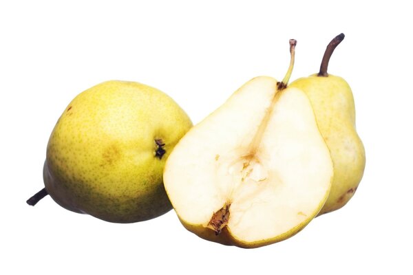 Two yellow pears, one cut in half