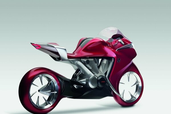 Prototipo de moto de carrera-bicicleta con ruedas milagrosas