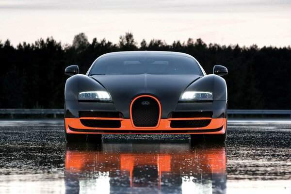 Brand new bugatti in the pouring rain