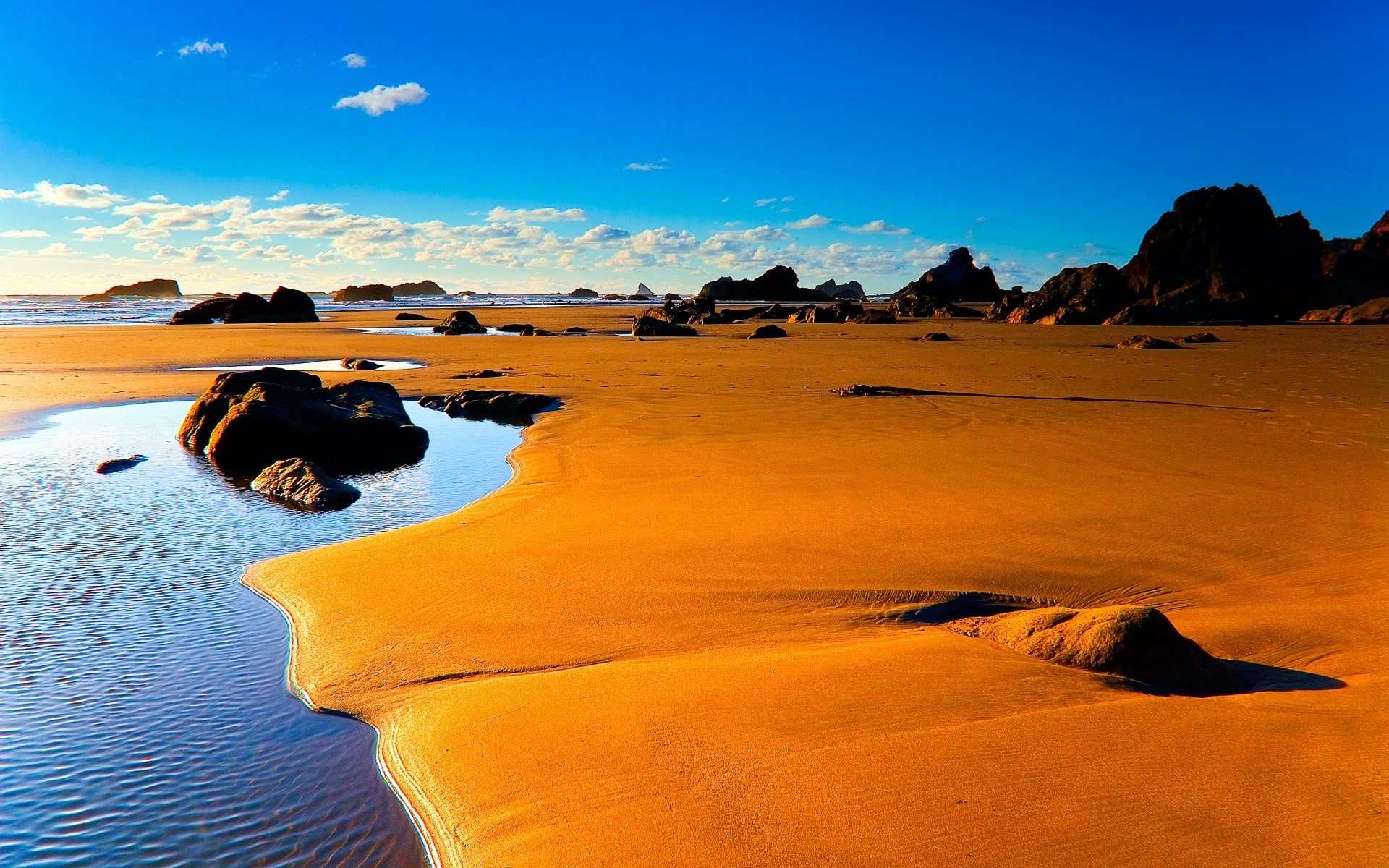 sable pierres nuages