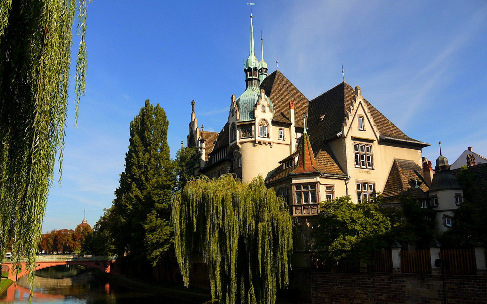 the building trees bridge water