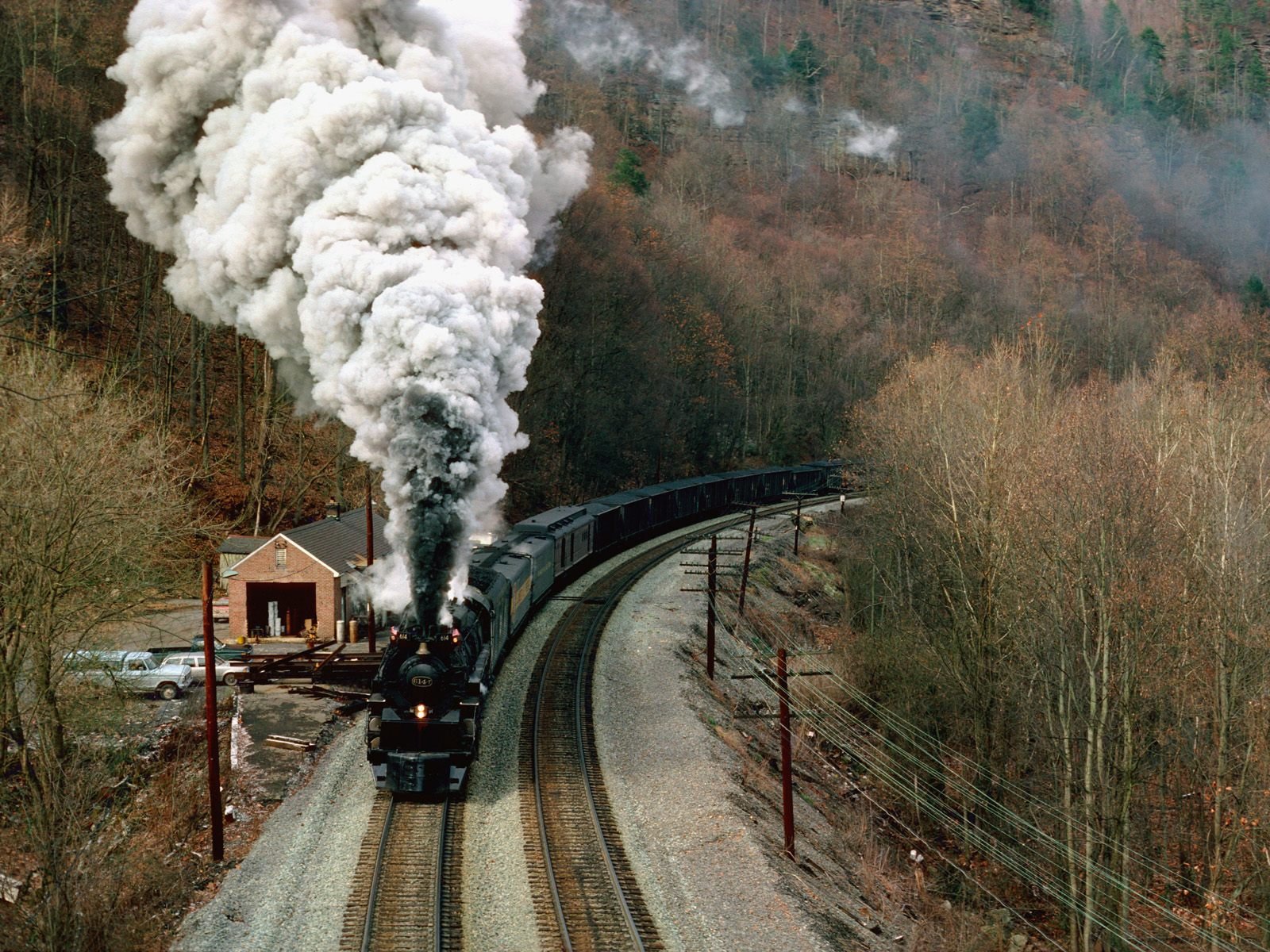 train autumn smoke mountain