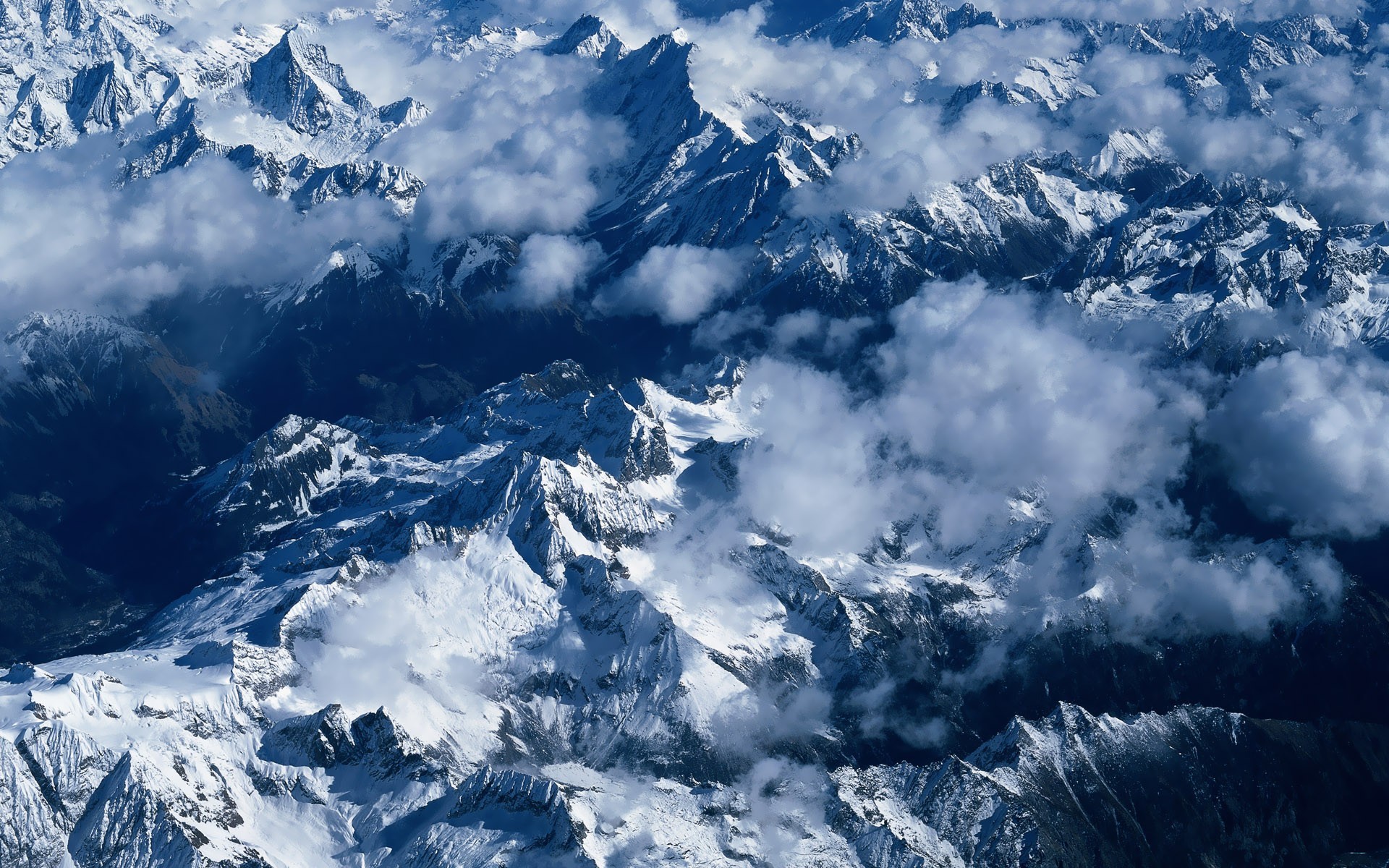 montañas nubes nieve