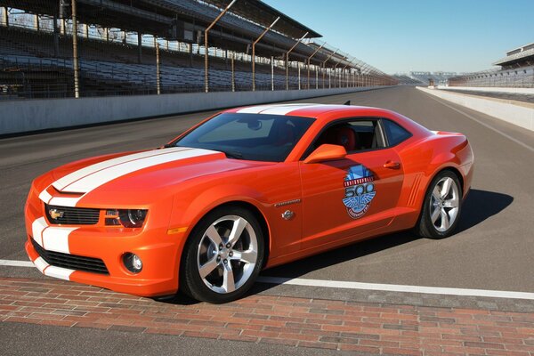 Chevrolet camaro ss orange on the sports track