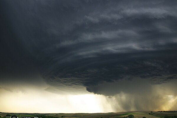 Gloomy photo of the storm in the field