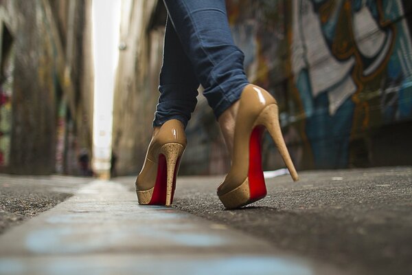 High-heeled shoes with red soles