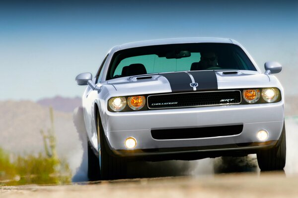 Dodge challenger rides in the middle of the desert