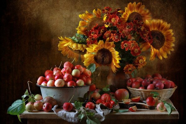 Still life Bright sunflowers and orange flowers and apples