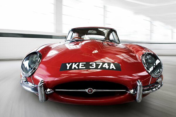 Vintage Jaguar car in red