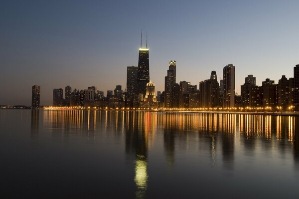 Chicago at night with reflection in the water