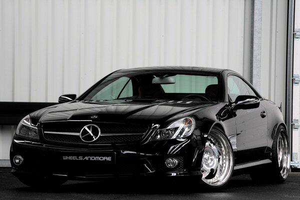 Tuning of a black Mercedes coupe