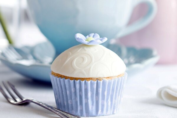 Sweet dessert in a lilac package with a flower