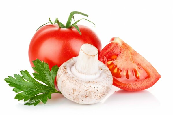 Mushrooms with tomato on a white background