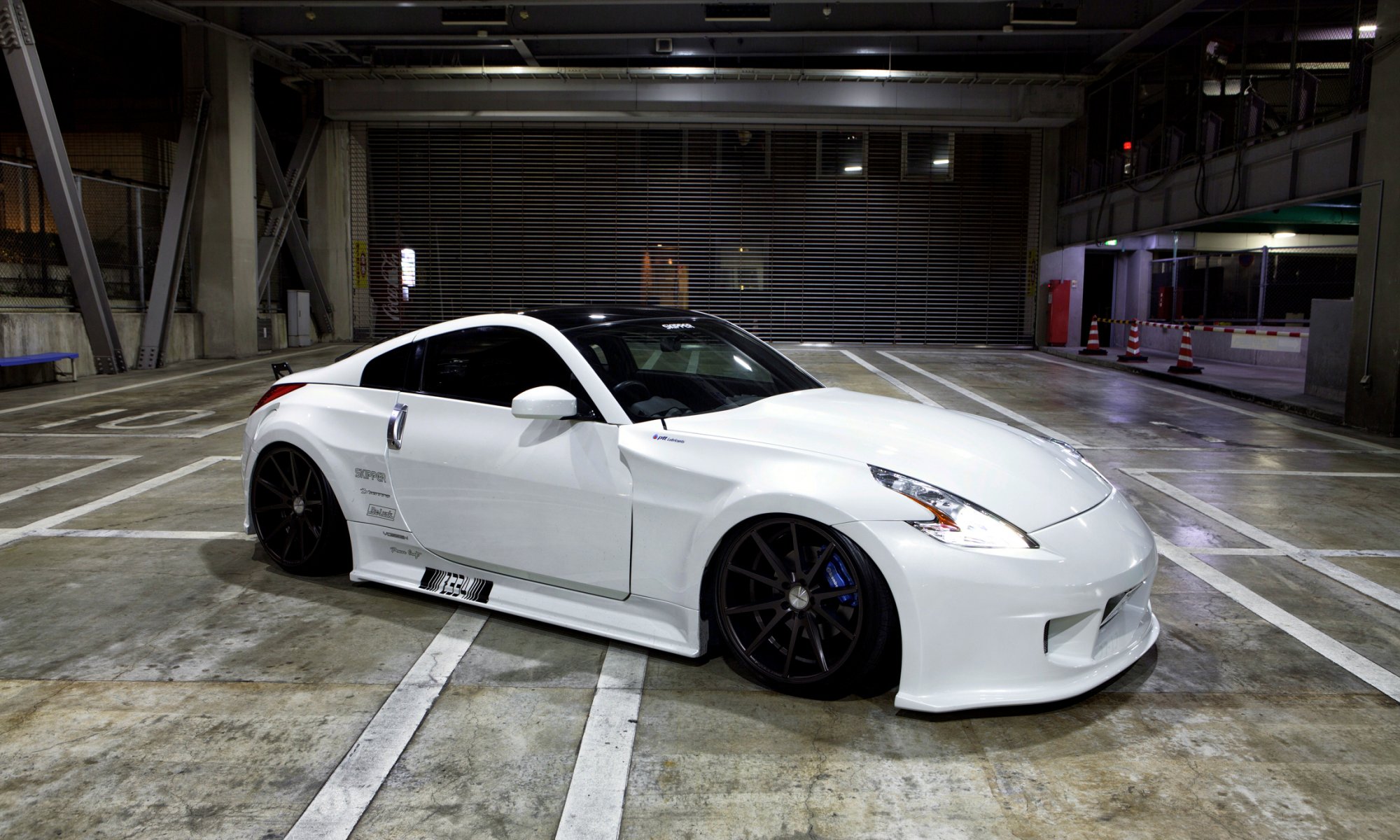 nissan 370z posición blanco ruedas vossen