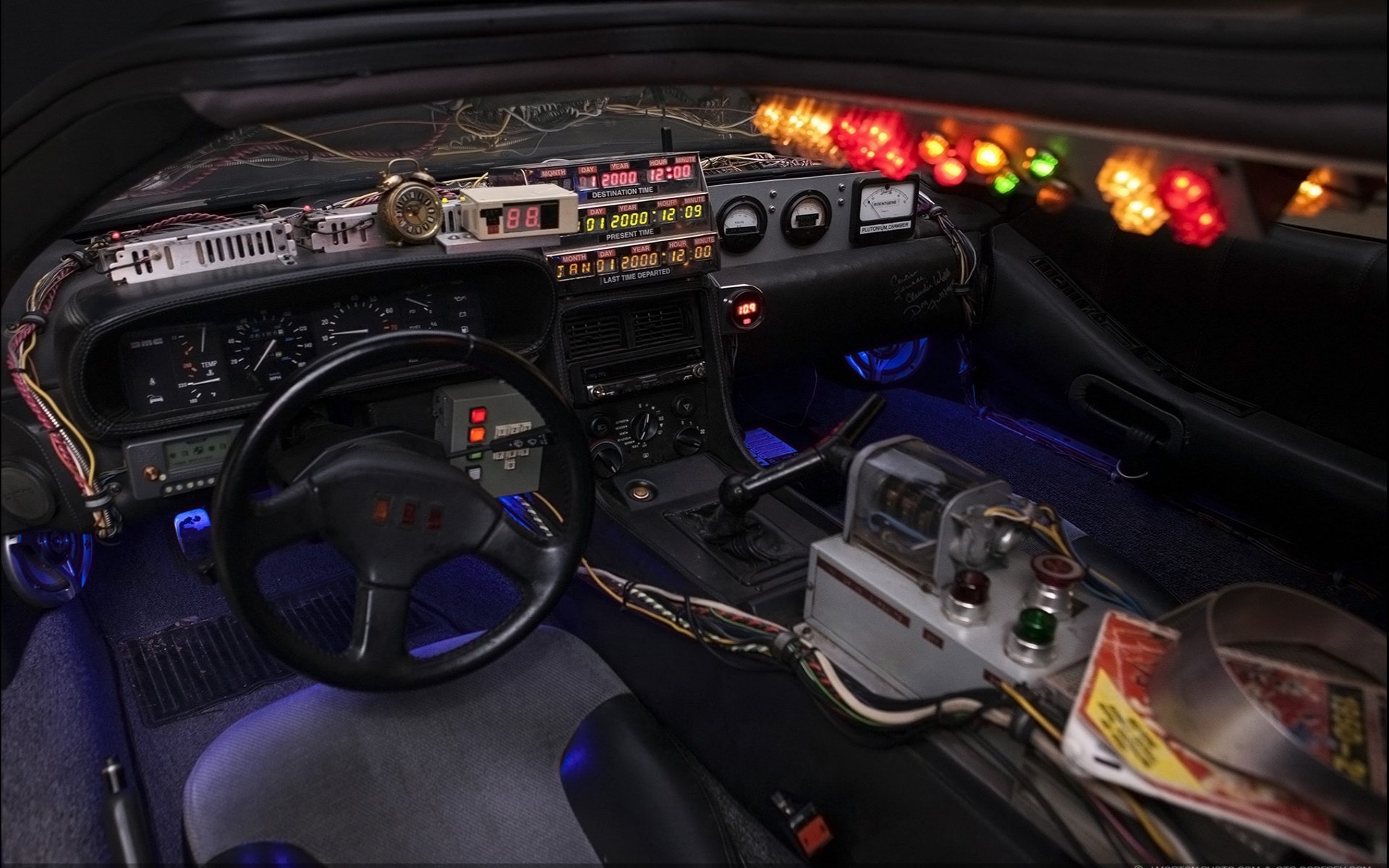 delorean dmc-12 back to the future time machine delorean interior steering wheel instruments background