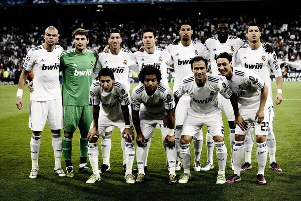 Football team at the stadium in summer