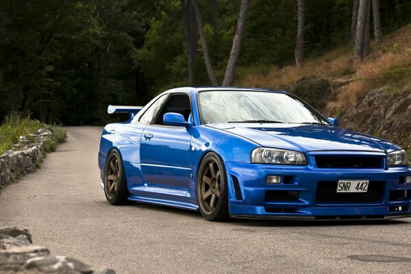 Nissan Skyline on asphalt in daylight