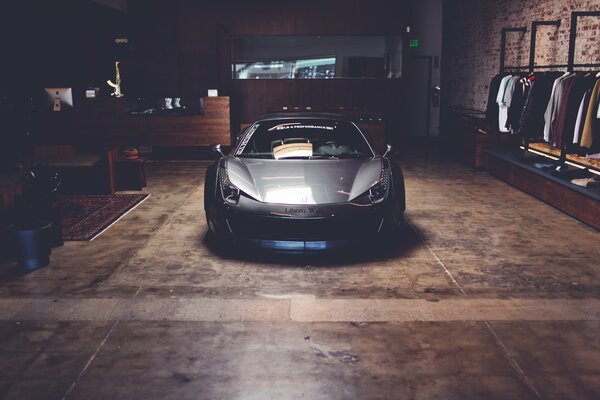 Black Ferrari car in the garage