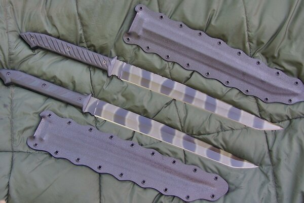 Purple camouflage knife on fabric