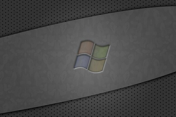 Multi-colored windows logo on a background of gray matte metal