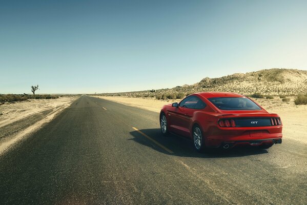 Red Mustang on American roads