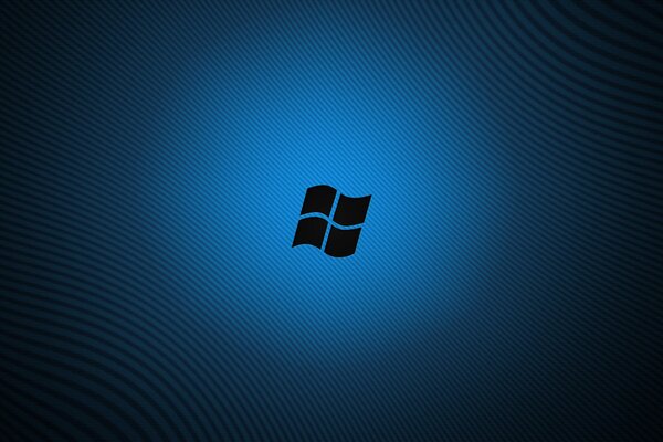 Логотип windows светится на синем фоне