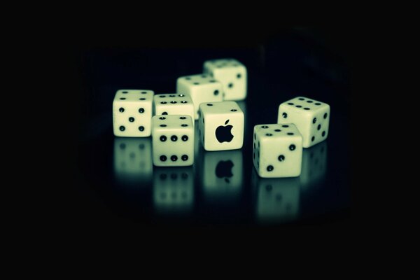 Cubes on a black background with apple