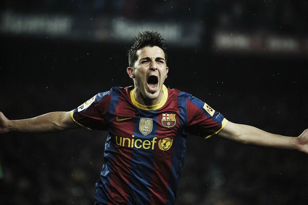 Photo of David Villa after scoring a goal