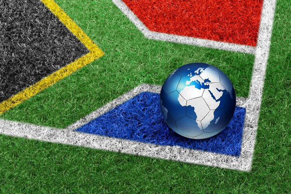 Fußball in Form eines Planeten Erde auf dem Hintergrund der Flagge von Südafrika