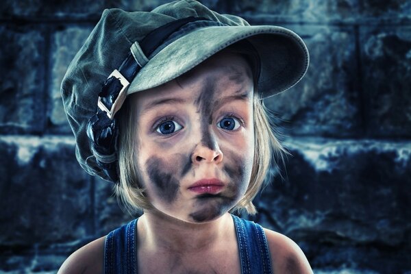 A little girl with a dirty face