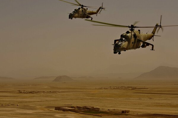 Mi-35 transport and combat helicopter in the desert