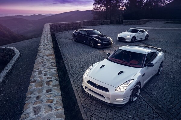 White nissan r35 with headlights on