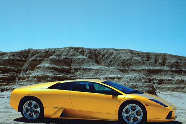 Yellow lamborghini in the mountains