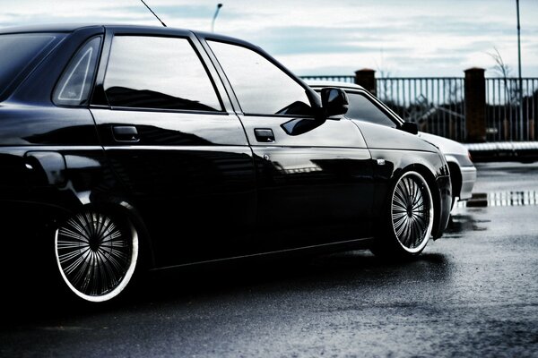 Priora s black painted Lada with tinted windows