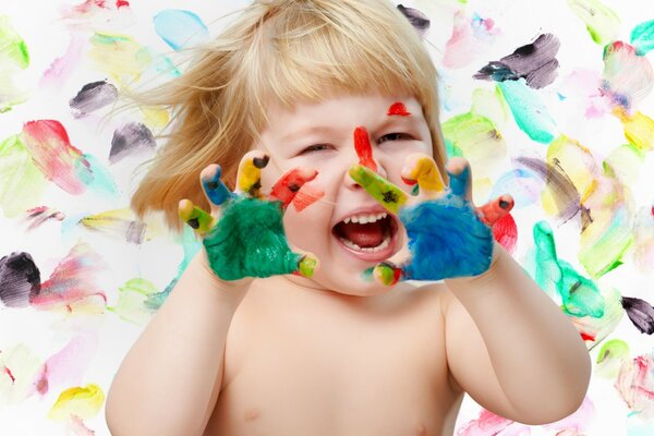 Cheerful girl shows her hands