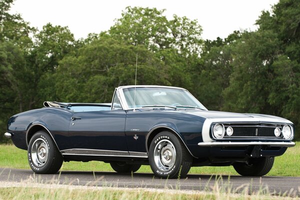 Chevrolet convertible car on the road