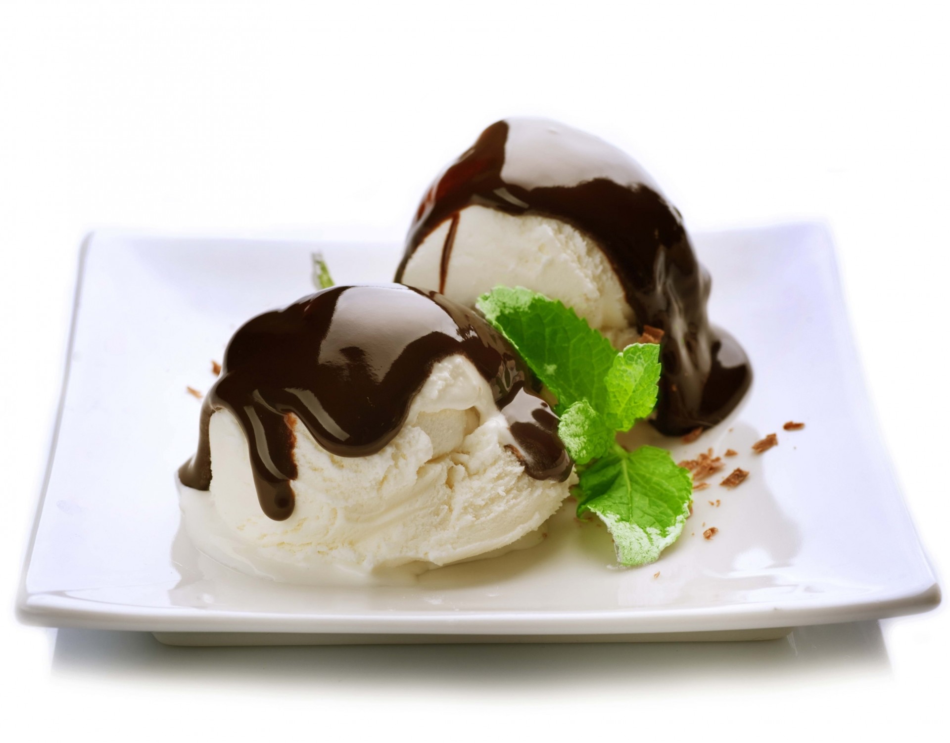 heet balls chocolate white background plate ice cream