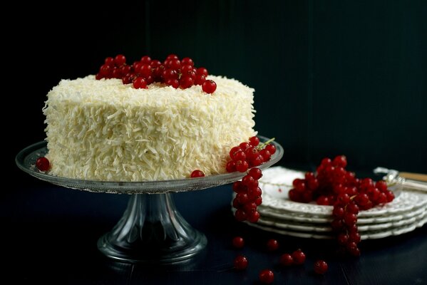 Cake with red currant on a stand