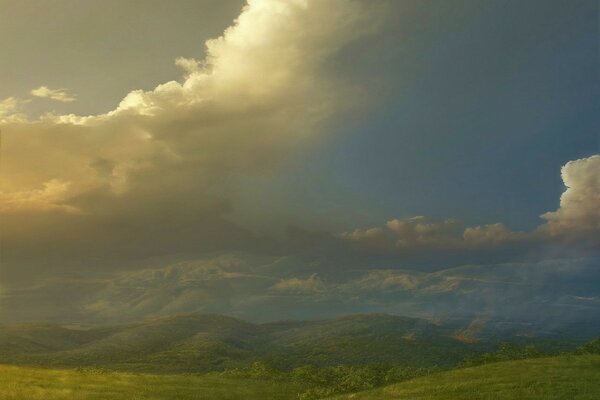 Lush clouds among green hills