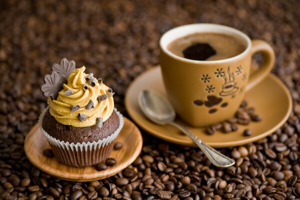 Chocolate dessert on a saucer and coffee