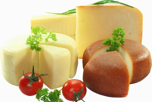 Pieces of cheese and tomatoes with herbs