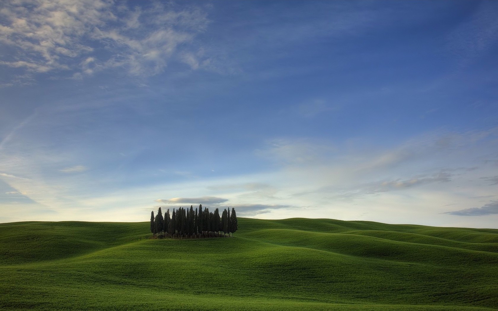 campo colline alberi nuvole