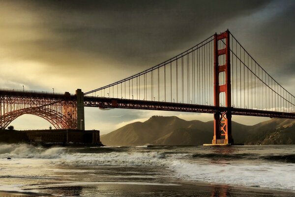 A bridge against a gloomy dark sky