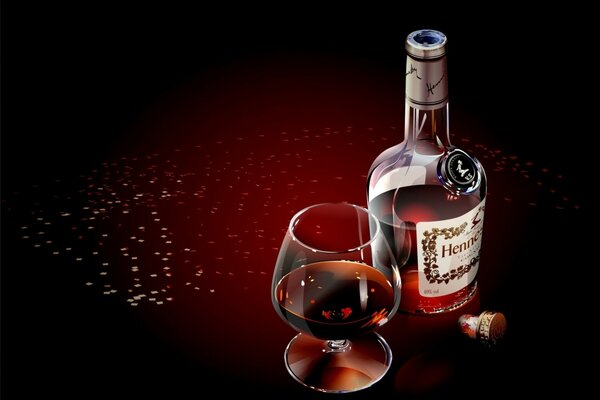 Cognac forte in un bicchiere con uno spuntino