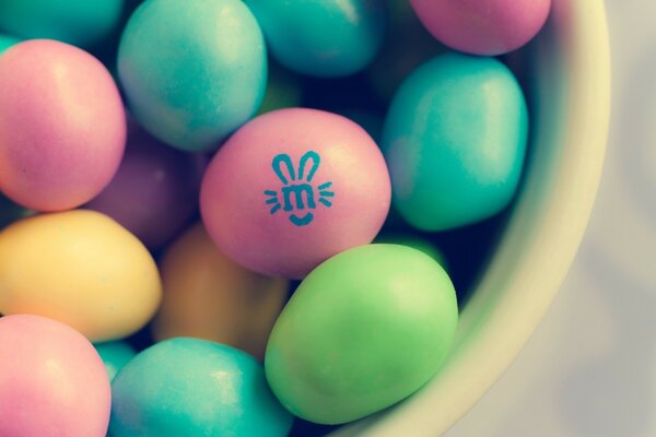 Colorful Easter eggs in a white plate