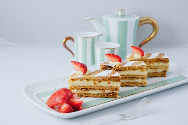 Dessert with strawberries and tea set